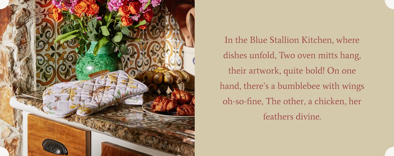In the Blue Stallion Kitchn, where dishes unfold, Two oven mitts hang, their artwork quite bold! On one hand, there